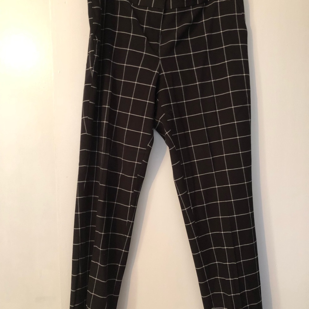 Black and white slacks.